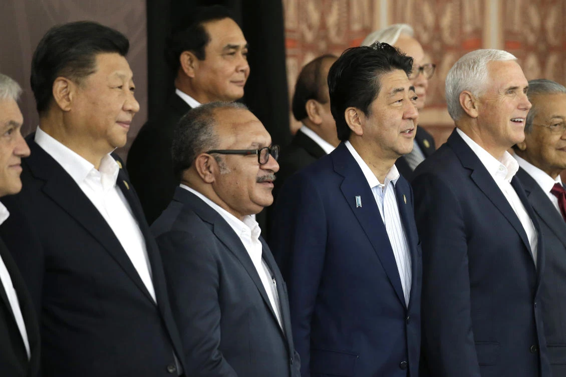 From left, Chinese President Xi Jinping, Papua New Guinea's Prime Minister Peter O'Neill, Japanese Prime Minister Shinzo Abe, and U.S. Vice President Mike Pence pose for a group photo at APEC Haus in Port Moresby, Papua New Guinea. (AP)