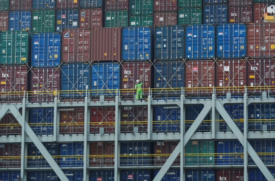 Freight containers on a container ship at DP World Southampton. The head of the ports operator said the psychological impact of US-China trade tensions were starting to translate into reality. (Reuters)