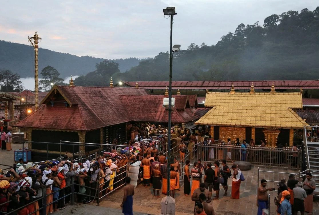 Hindu devotees queue inside Sabarimala temple in the southern Indian state of Kerala. (Reuters)