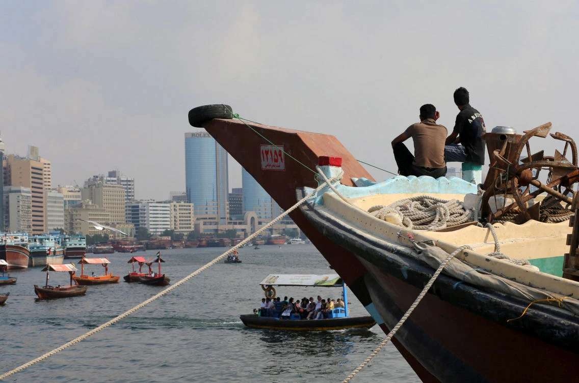 A trading dhow lies at anchor in Dubai Creek. Dubai, the UAE’s business hub, has traditionally been a major trading partner with Iran. (Reuters)
