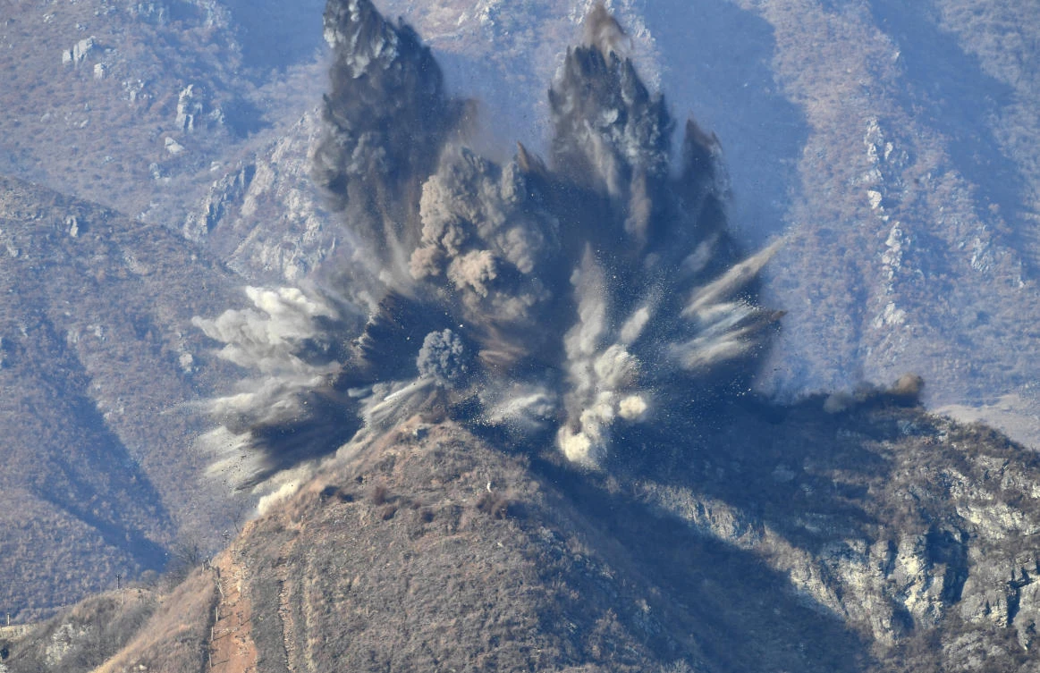 A North Korean guard post in the demilitarized zone is blown up in this picture taken from South Korea’s territory. (The Defense Ministry/Yonhap via Reuters)