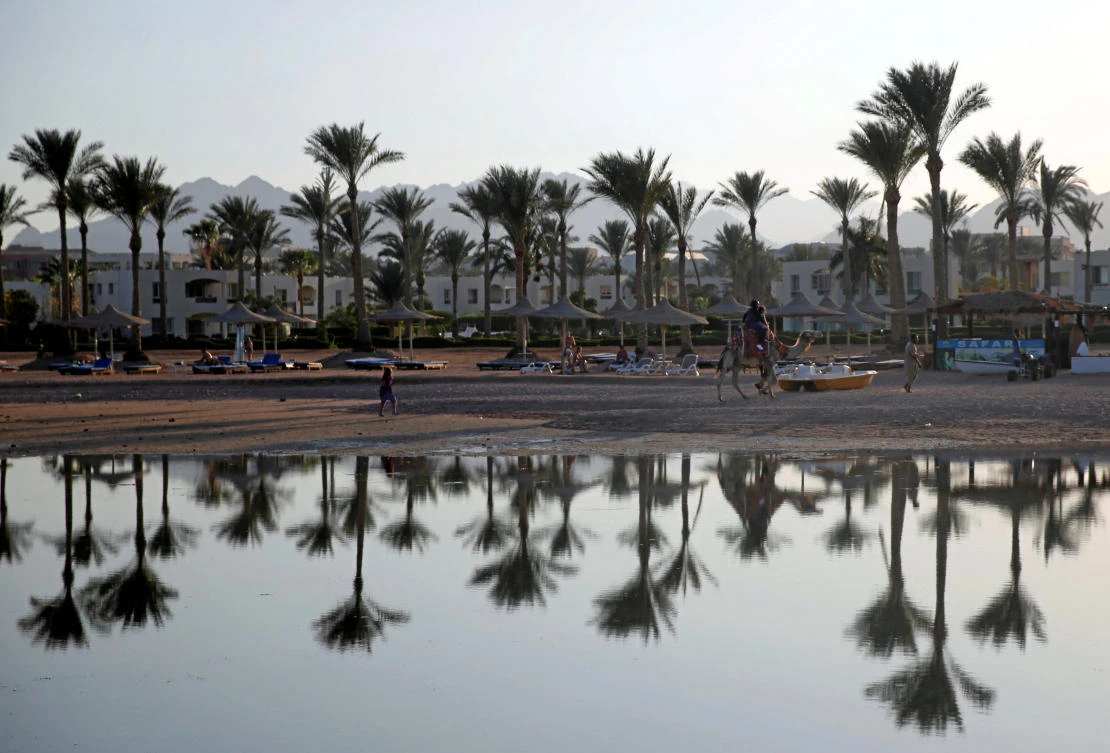 Tourists are seen on a beach in the Aqaba Gulf on the Red Sea resort of Sharm el-Sheikh, Egypt July 12, 2018. Picture taken July 12, 2018. (Reuters)