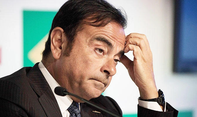 This file photo taken on January 4, 2016 shows chairman, president and CEO of Nissan Motor, Carlos Ghosn, gesturing during a press conference at the company's Brazilian headquarters in downtown Rio de Janeiro. (AFP)
