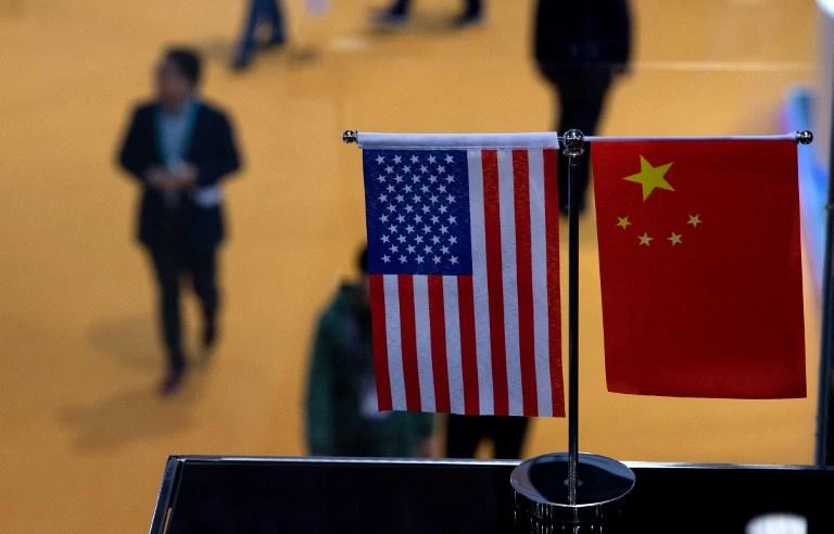 Trade tensions between the US and China have already shaved 0.1-0.2 percentage points off global GDP this year, the Economic Outlook report said. (AFP)