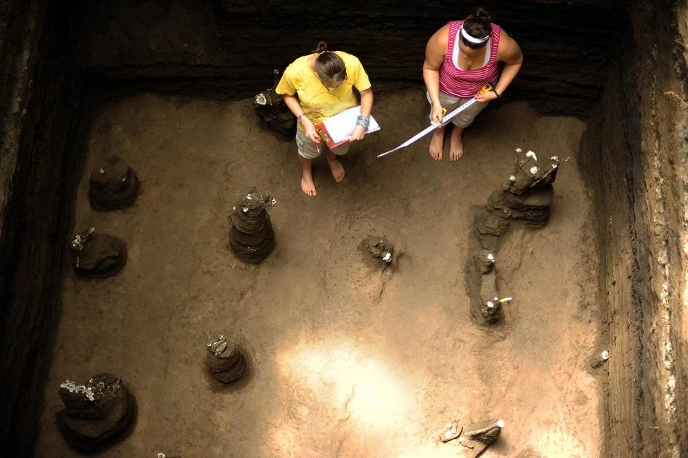 US archaeologists work on remains found at the Joya de Ceren archaeological site in the town of Opico, 35 km west of San Salvador, on July 1, 2011. (File/ AFP)