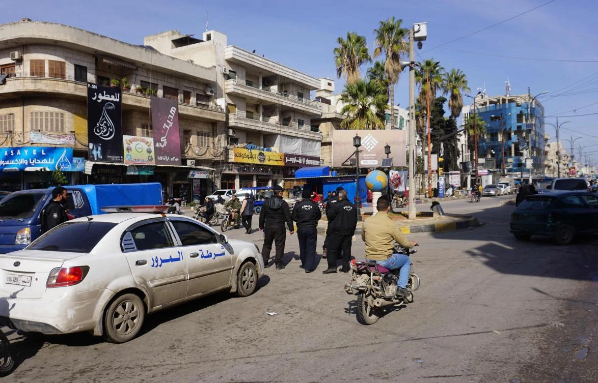 Masked gunmen in Syria’s rebel-held northwestern Idlib province shot and killed two prominent anti-government critics.
