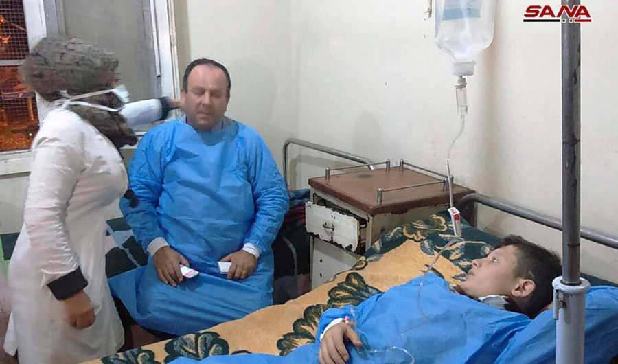 One doctor said two were in critical condition, including a child. (SANA via AP)