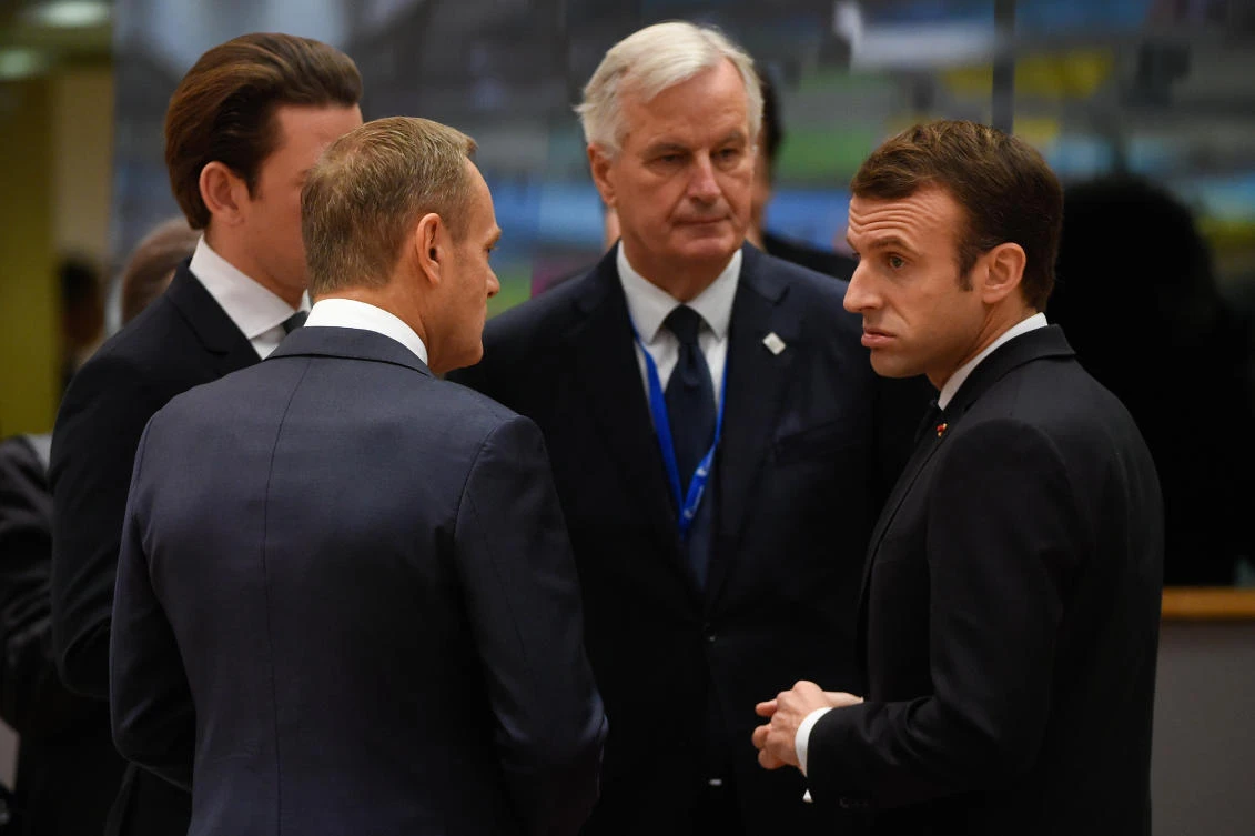 France’s President Emmanuel Macron (R) chats with EU chief Brexit negotiator Michel Barnier (C), Austria’s Chancellor Sebastian Kurtz (L) and European Council President Donald Tusk. Barnier described the Brexit as “sad” and “tragic”. (John Thys/AFP)