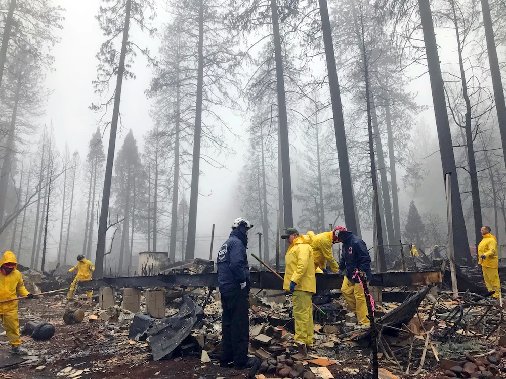 A massive wildfire that killed dozens of people and destroyed thousands of homes in Northern California has been fully contained after burning for more than two weeks. (AP)