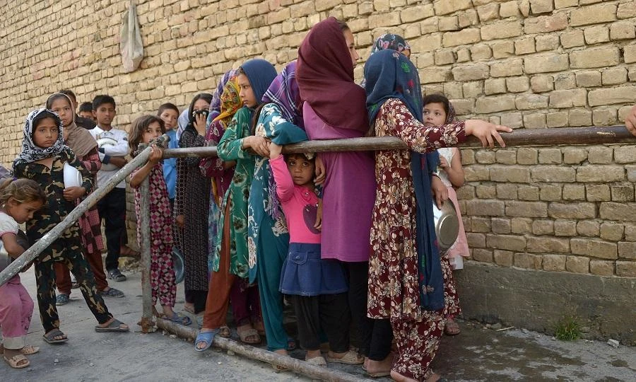 About 11 million people — almost half of Afghanistan’s rural population — will be facing “severe acute food insecurity” until February. (File/AFP)