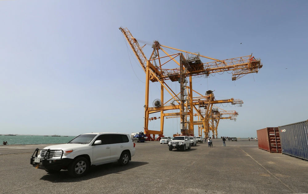 Vehicles transporting UN envoy to Yemen Martin Griffiths drive through Hodeidah port on Friday, Nov.23. (Reuters)