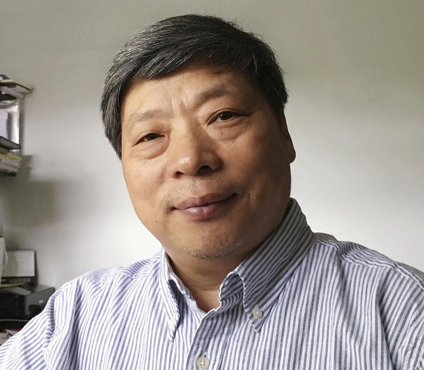 In this photo taken on July 2018 and released by Xu Xiaoli on Wednesday, Nov. 28, 2018, Lu Guang poses for a photo in New York. (AP)