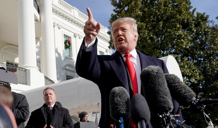US President Donald Trump talks to reporters as he departs for travel to the G20 summit in Argentina from the White House in Washington on November 29, 2018. (REUTERS/Jonathan Ernst)