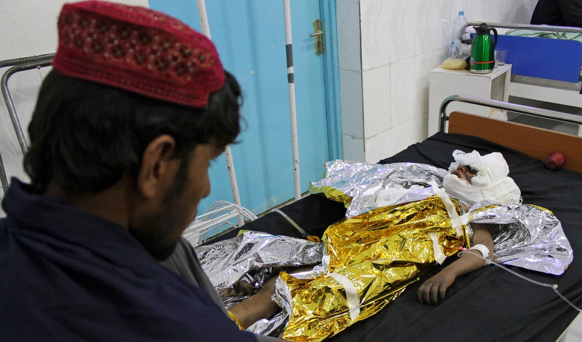 In this file photo, an injured boy receives treatment at a hospital after an airstrike in Helmand province, southern Afghanistan, Wednesday, Nov. 28, 2018. (AP)