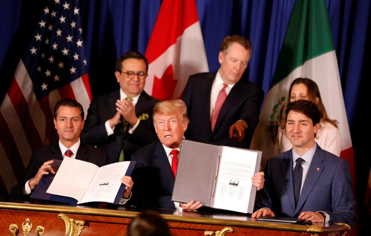 US President Donald Trump, Mexico’s President Enrique Pena Nieto and Canada’s Prime Minister Justin Trudeau attend the USMCA signing ceremony before the G20 leaders summit in Buenos Aires, Argentina November 30, 2018. (Reuters)