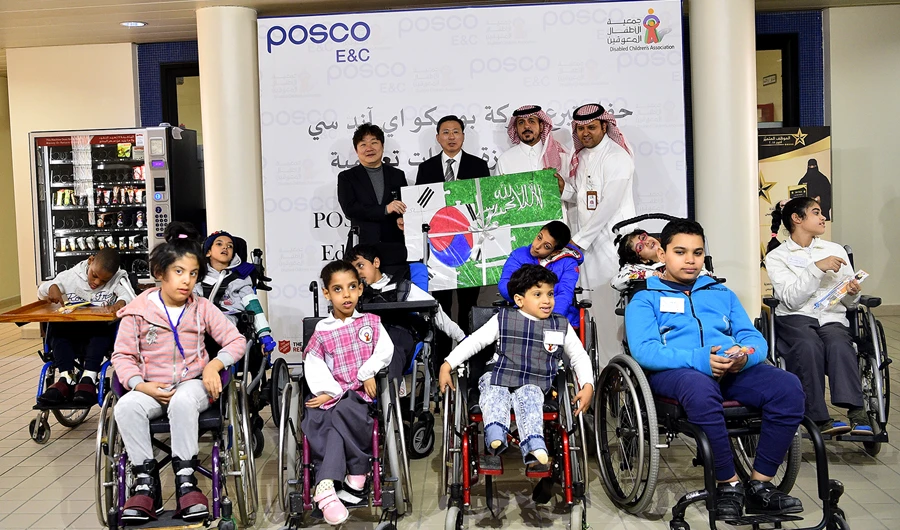 Korean Ambassador to Saudi Arabia Jo Byung Wook and other officials with children with disabilities in Riyadh. (Photo/Supplied)