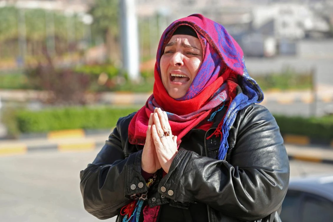 Nancy Roxana Papa, an 54-year-old Argentinian woman who was recently released after being kidnapped since 2016, speaks to the press at the Bab al-Hawa crossing with Turkey on October 30, 2018 ahead of being handed over to Turkish authorities. (AFP)