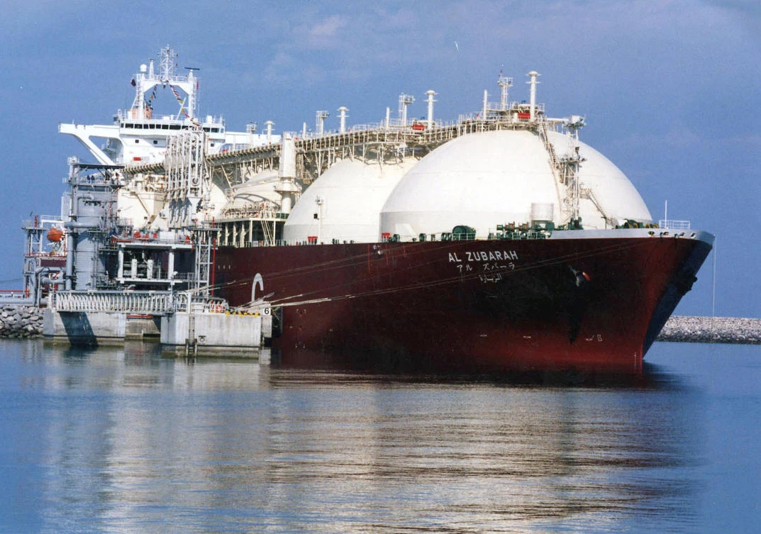 A liquid natural gas tanker being loaded in northern Qatar. The Arab nation, which has been under a trade embargo by a group of Arab states, announced on Monday that it would switch its focus to gas production. (AP Photo)