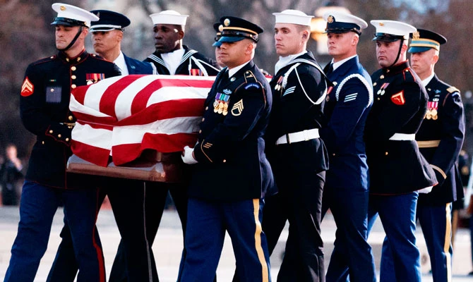 Washington pays respects to Bush as he lies in state at Capitol