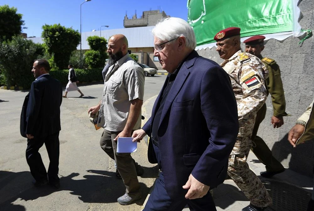 UN envoy to Yemen Martin Griffiths (C) leaves after a meeting with the President of the Huthi Revolutionary Committee, in the capital Sanaa, on November 24, 2018. (File/AFP)