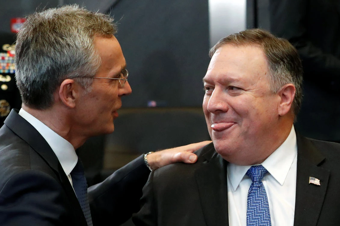 US Secretary of State Mike Pompeo and NATO’s Secretary General Jens Stoltenberg speak as they attend a session during the meeting of NATO foreign ministers at the Alliance’s headquarters in Brussels, Belgium, December 4, 2018. (Reuters)