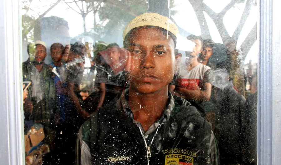 Rohingya Muslim people as seen inside a room at Kuala Idi Rayeuk port after arriving on a wooden boat in Aceh Timur, Indonesia, on Dec. 4, 2018. (REUTERS)