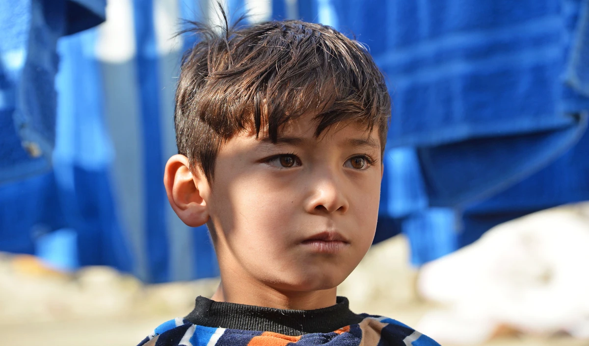 Murtaza Ahmadi, a supporter of Argentine footballer Lionel Messi, outside his home in Kabul on Dec. 3, 2018. (AFP)
