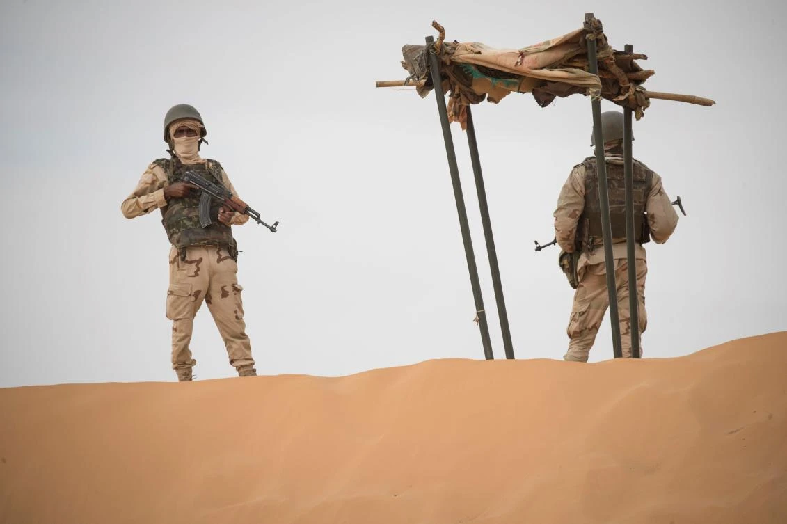 Mauritanian soldiers stand guard near the border with Mali. Remote areas have been targeted by extremists and other armed groups that have proliferated in Africa’s Sahel region. (AFP)