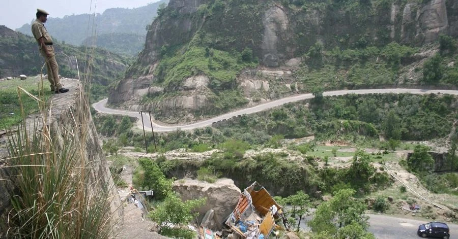 The bus was ripped into several parts after hitting the rocks. (File/AFP)