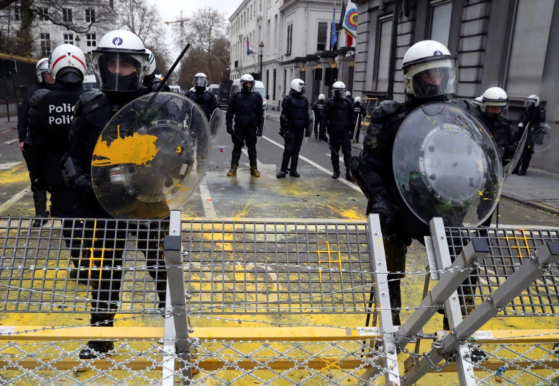 Members of riot police are seen during the "yellow vests" protest against higher fuel prices, in Brussels, Belgium, December 8, 2018. (Reuters)