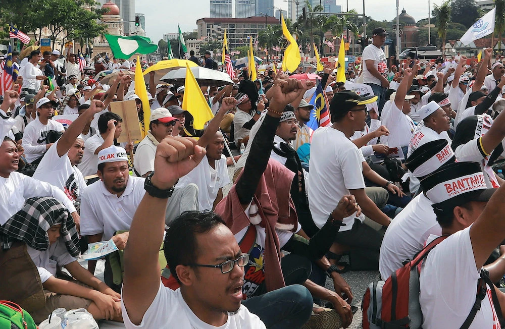 People take part in an Anti-ICERD (International Convention on the Elimination of All Forms of Racial Discrimination) mass rally in Kuala Lumpur, Malaysia, December 8, 2018. (Reuters)