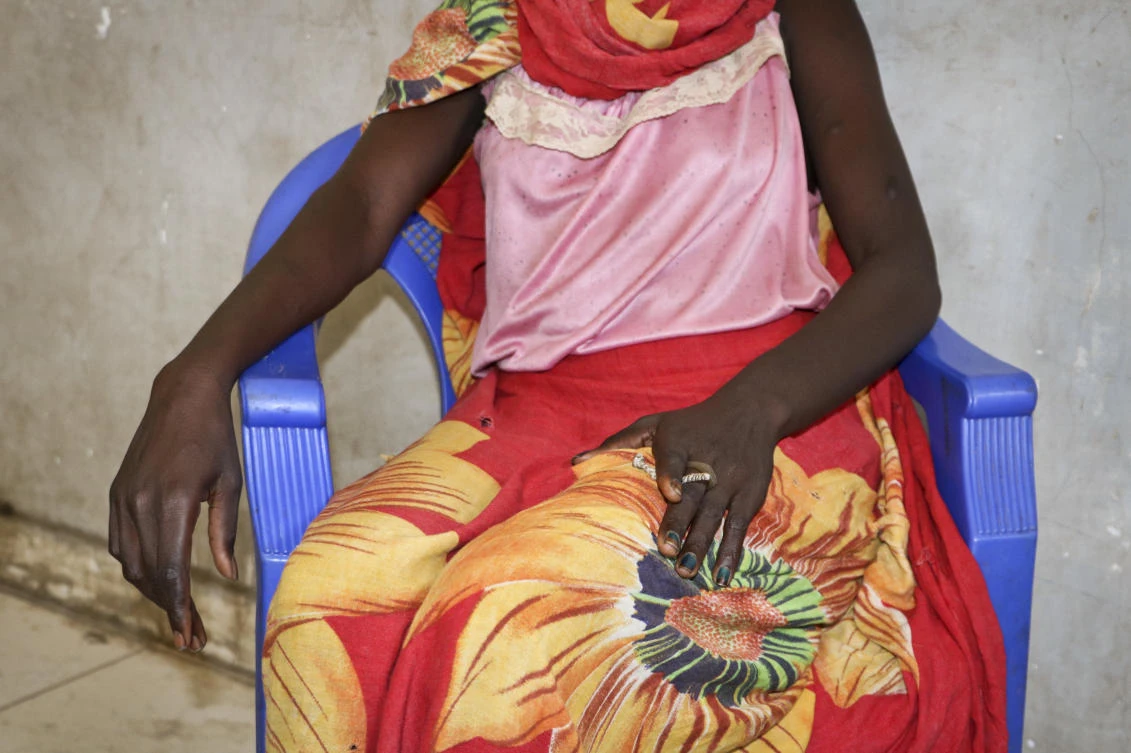 An 18-year-old woman recounts the day in early November when she and a friend were bound, dragged into the bush and raped by four men with guns, as she sits in a hospital in Nhialdu, South Sudan. (Sam Mednick/AP)