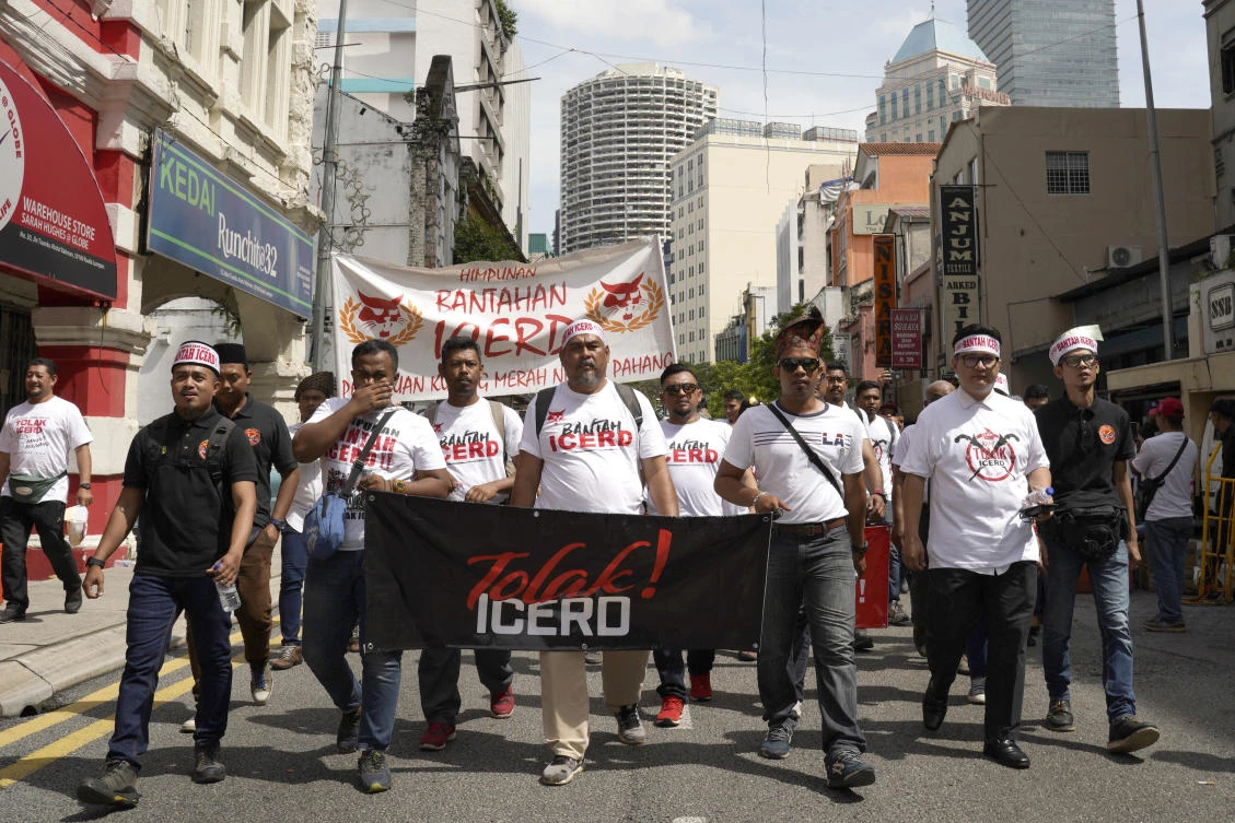Protesters attend a rally to celebrate the government's move to withdraw plans to ratify a UN anti-discrimination convention at Independent Square in Kuala Lumpur, Malaysia, Saturday, Dec. 8, 2018. (AP)