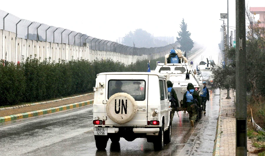 UN Interim Force in Lebanon (UNIFIL) vehicles patrol along the border with Israel near the southern Lebanese village of Kfar Kila on Dec. 6. (AFP)