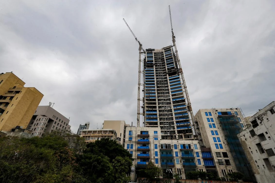 An unfinished building under construction with cranes in the Lebanese capital Beirut. AFP