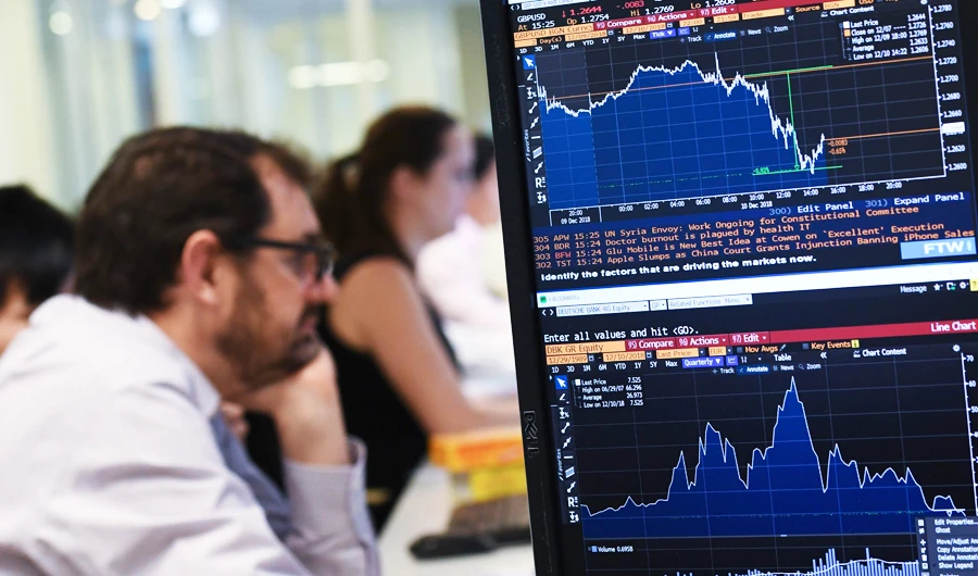 The pound, already foundering Monday amid rumors that the vote would be postponed, sank further on the news, hitting a 20-month low against the dollar of $1.2550 (AFP)