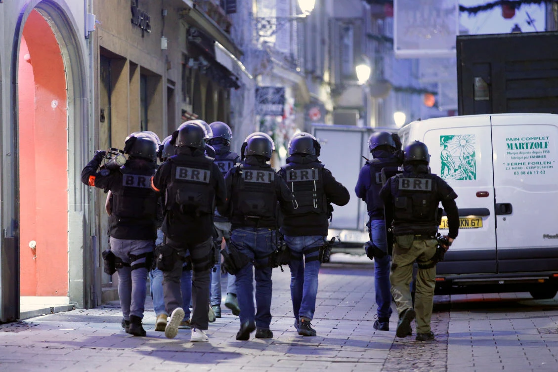 Members of French special police forces of Research and Intervention Brigade (BRI) attend a police operation the day after a shooting in Strasbourg, France, December 12, 2018. (Reuters)