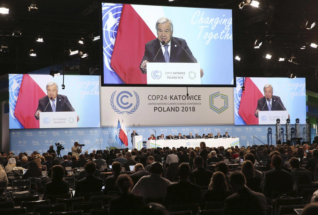 UN Secretary General Antonio Guterres appears on screens when delivering a speech during the opening of COP24 UN Climate Change Conference 2018 in Katowice, Poland .(AP/File Photo)