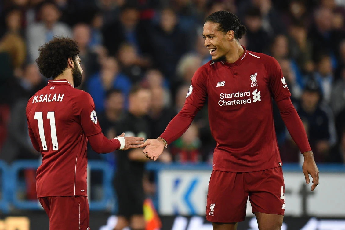 With the current form of Mohamed Salah it is perhaps no surprise to find Van Dijk confident for the rest of the Champions League campaign. (AFP)