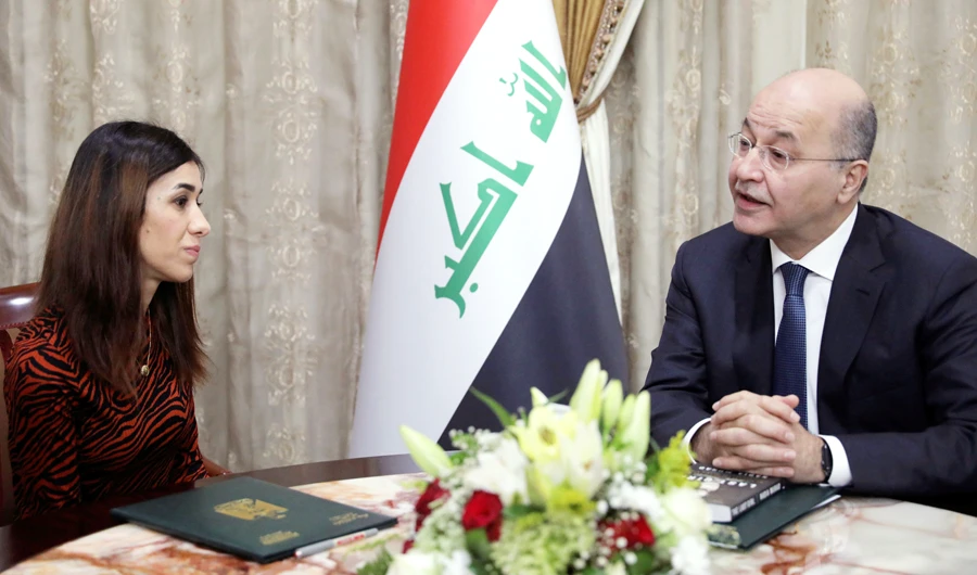 Nobel laureate returns to Iraq, pledges to work for peace