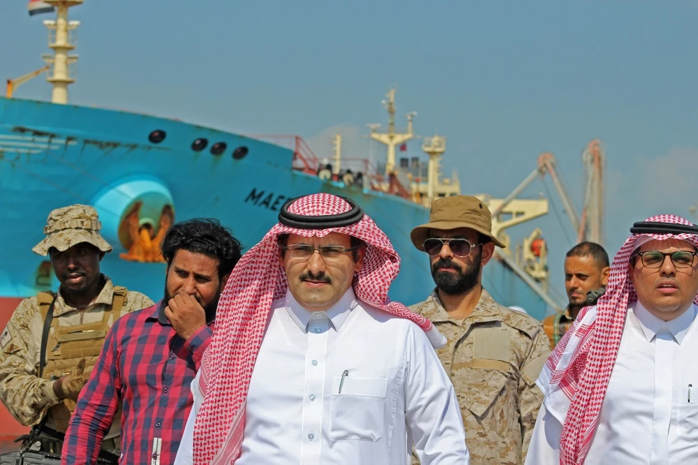 Saudi ambassador to Yemen Mohammed Said Al-Jaber (C) arrives in the southern Yemeni port of Aden to oversee an aid delivery of fuel from Saudi Arabia on October 29, 2018. (File/AFP)