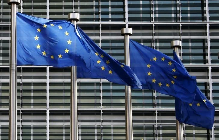 File photo showing European Union flags flutter outside the EU Commission headquarters in Brussels. (Reuters)