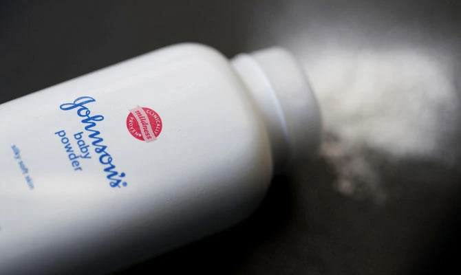 In this file photo taken on July 13, 2018, In this photo illustration, a container of Johnson's baby powder made by Johnson and Johnson sits on a table on in San Francisco, California. (AFP)