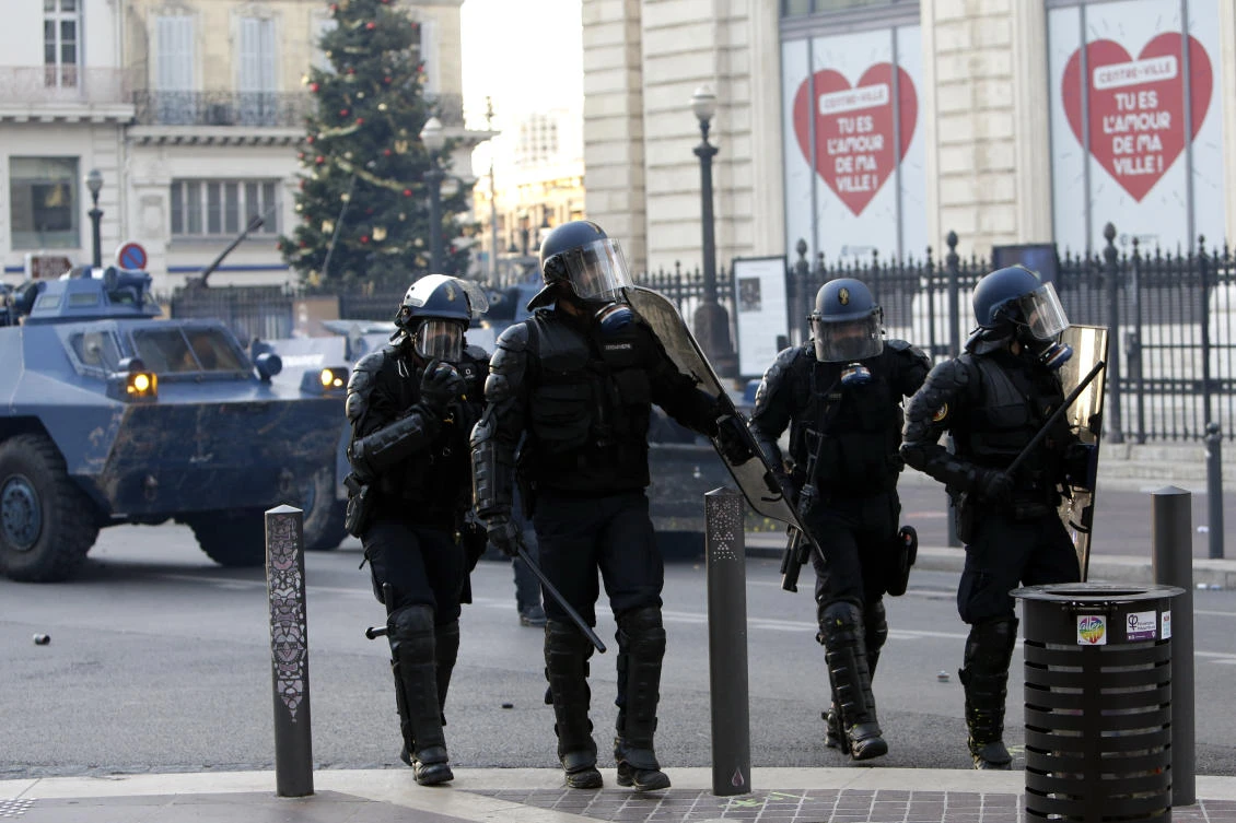 Riot police officers take position during clashes. (File/AP)