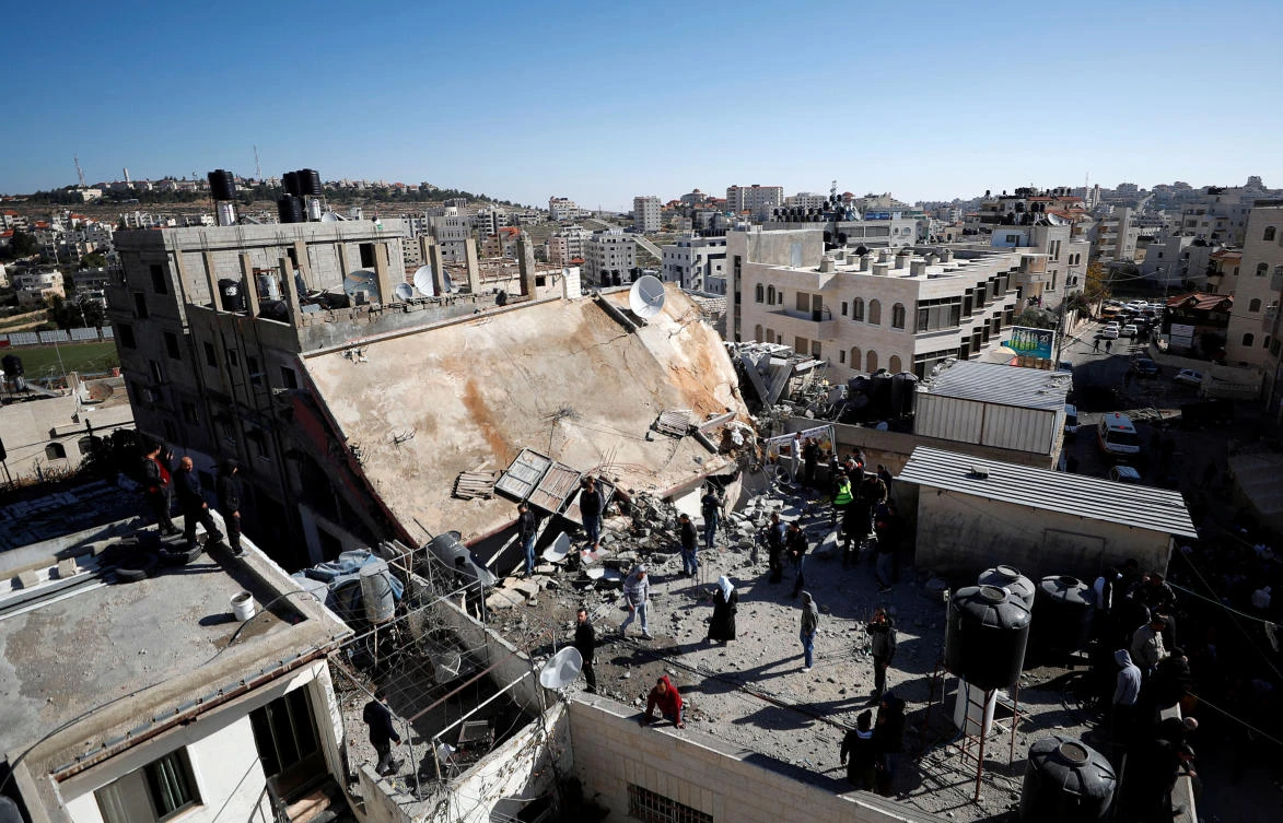 House of Palestinian family Abu Humaid is seen after it was blown up by the Israeli forces in Al-Amari refugee camp in Ramallah, in the Israeli-occupied West Bank. (Reuters)