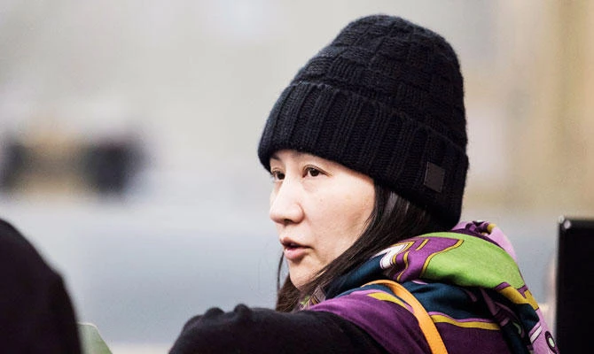 Huawei chief financial officer Meng Wanzhou arrives at a parole office in Vancouver, British Columbia, Wednesday, Dec. 12, 2018. (AP)