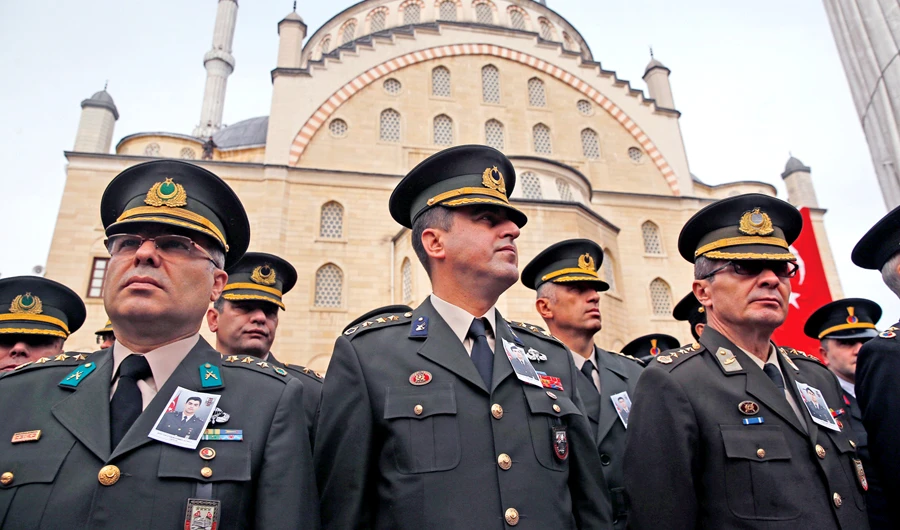 Military officers attend the funeral procession of a Turkish soldier killed in Afrin. (AP/file)