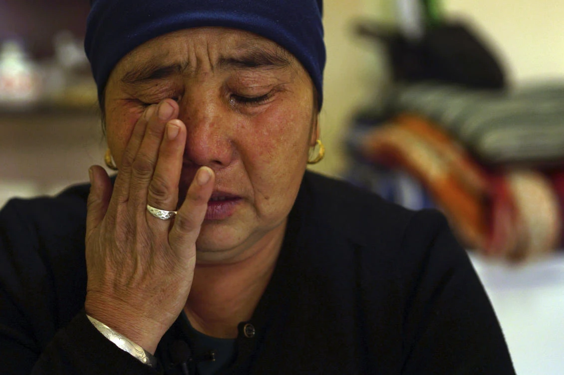 In this Dec. 6, 2018 photo, Nurbakyt Kaliaskar cries as she speaks about her daughter's detainment in a Chinese internment camp during an interview in Almaty, Kazakhstan. (AP)
