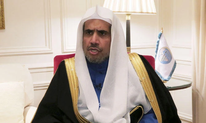 Mohammed al-Issa, head of the Muslim World League (MWL) speaks during an interview with Reuters at a hotel in Paris, France, November 23, 2017. (REUTERS)