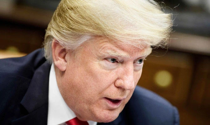 In this file photo taken on December 18, 2018, US President Donald Trump speaks during a roundtable discussion about school safety in the Roosevelt Room of the the White House in Washington, DC. (AFP)